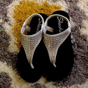 Whitish with silver sandals